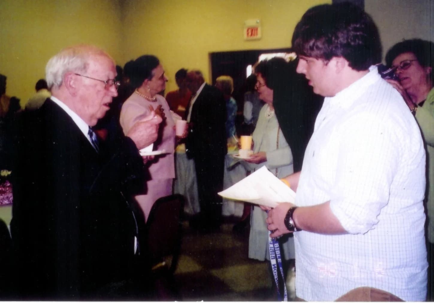 Fred Craddock with a student. Public domain.