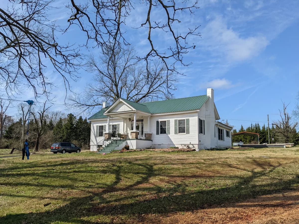 A farmhouse in Alabama, morning light — where the letter was written