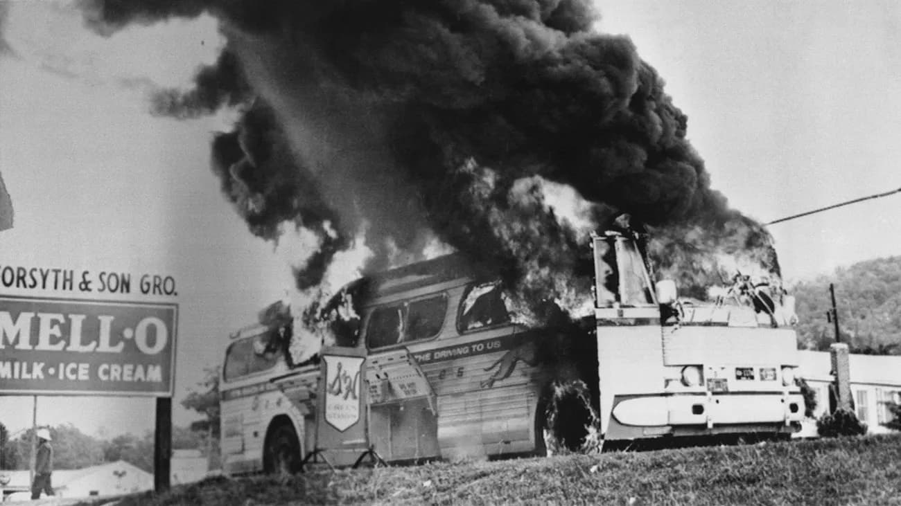 The Greyhound bus carrying Freedom Riders burning on Highway 202 outside Anniston, Alabama, May 14, 1961