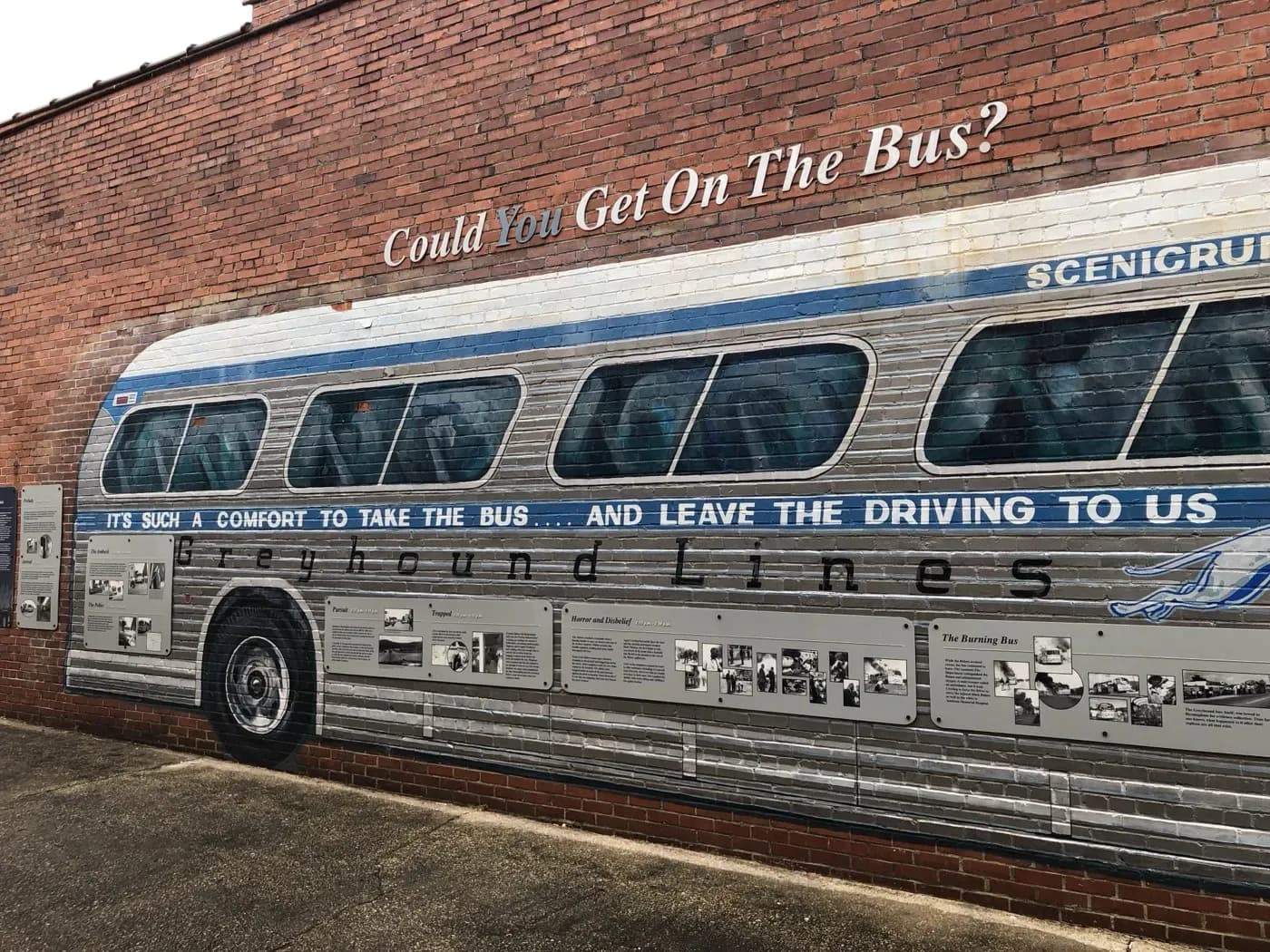 The Freedom Riders mural on Gurnee Avenue in Anniston, Alabama, depicting a Greyhound bus with the question 'Could You Get On The Bus?' painted above it