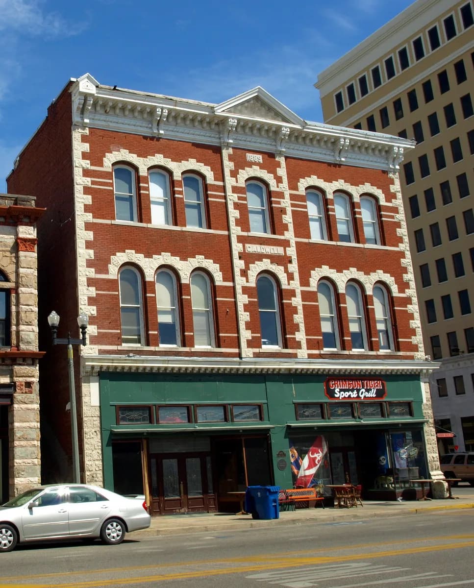 The Caldwell Building at 1001 Noble Street, Anniston, Alabama — built 1889, Italianate, listed on the National Register of Historic Places